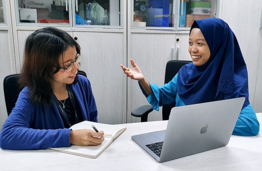 one woman interviewing another woman